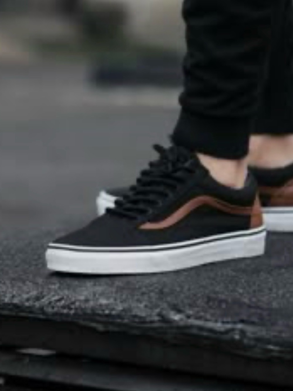 Vans Black Low-Top Sneakers with Brown Stripe